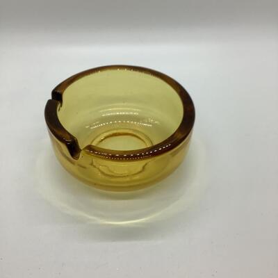 Yellow tint glass ashtray