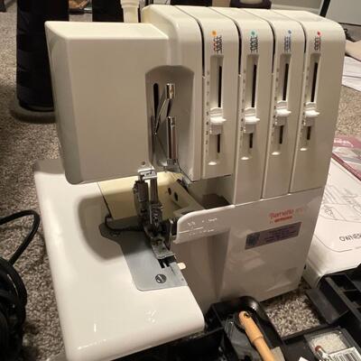 U46-Bernette 800 D With sewing books, machine attachments, craft miscellaneous