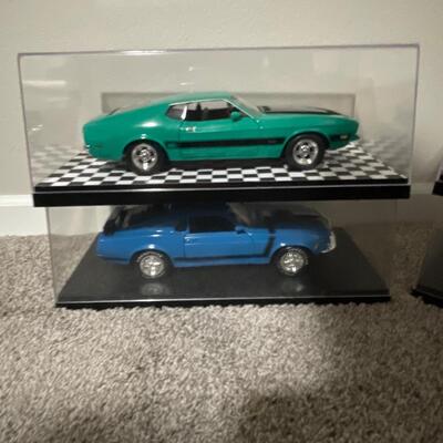 M7- Mustang lot in display cases x four