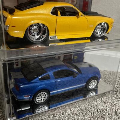 M9-Mustang lot in Plastic display cases