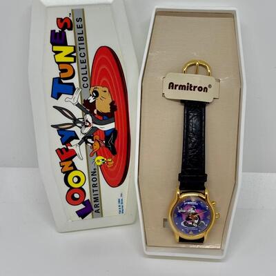 LOT J147: New Warner Brothers, Pepe Le Pew Penelope Musical Watch 