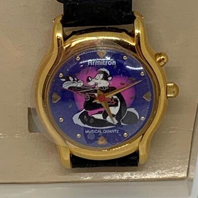 LOT J147: New Warner Brothers, Pepe Le Pew Penelope Musical Watch 