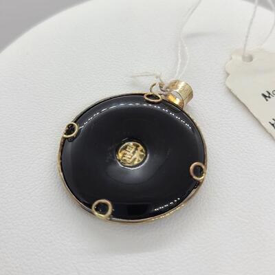 LOTJ: 14kt Yellow Gold and Onyx Pendant