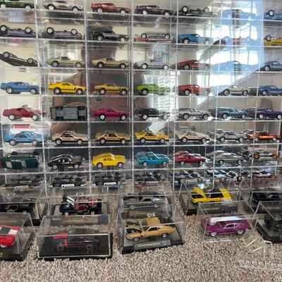 M71-Mustang car lot, Two plexi cases and individually protected cars