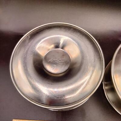 87 - 2 stainless sauce bowls
