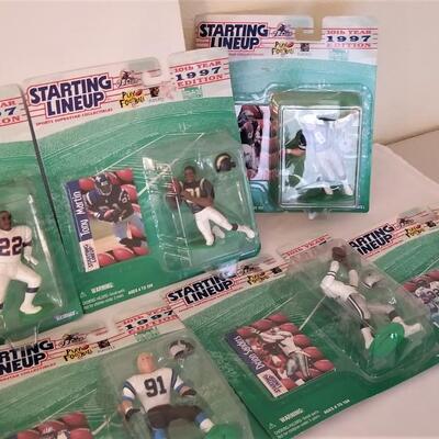 Lot #94  Large Lot of 1997 "Starting Lineup" football player action figures - all new on card