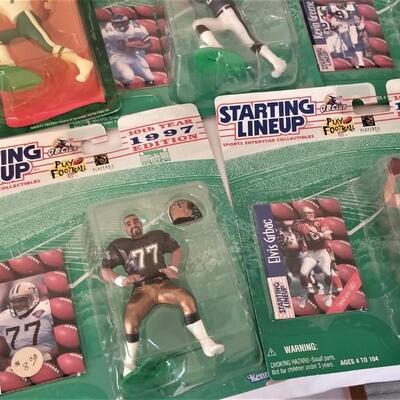 Lot #94  Large Lot of 1997 "Starting Lineup" football player action figures - all new on card