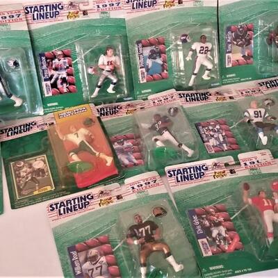 Lot #94  Large Lot of 1997 "Starting Lineup" football player action figures - all new on card