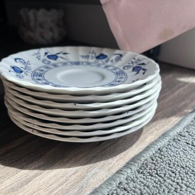 Blue onion saucer plates
