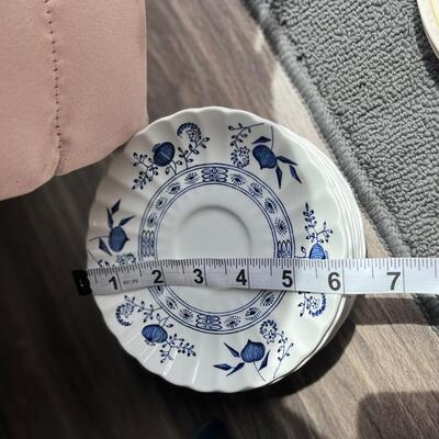 Blue onion saucer plates