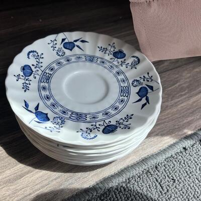 Blue onion saucer plates