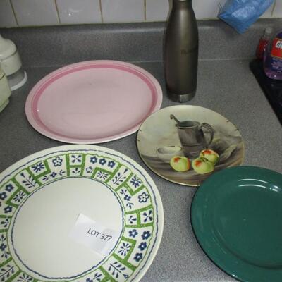 Kitchen= cups, plates, caniter