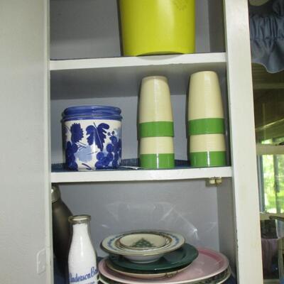 Kitchen= cups, plates, caniter