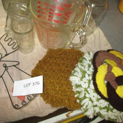 Kitchen-- jars, pot holders, measuring cups