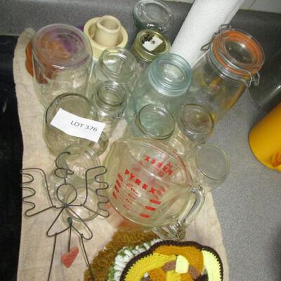 Kitchen-- jars, pot holders, measuring cups