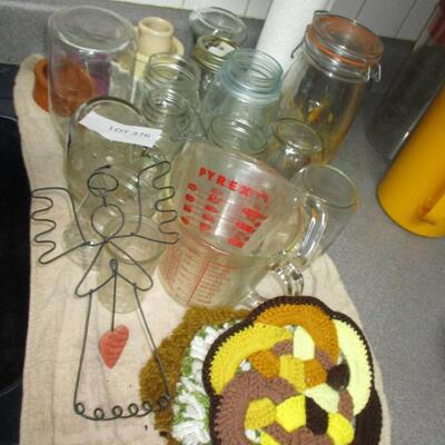 Kitchen-- jars, pot holders, measuring cups