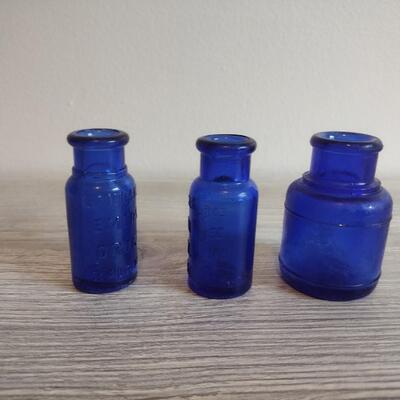 Set of 3 blue apothecary bottles