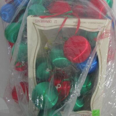 #35 Christmas tree ornaments and one large floral pic