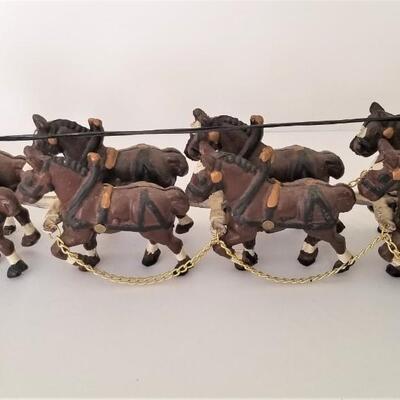 Lot #101  Cast Iron Toy - Horses and Wagon