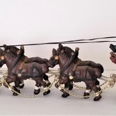 Lot #101  Cast Iron Toy - Horses and Wagon