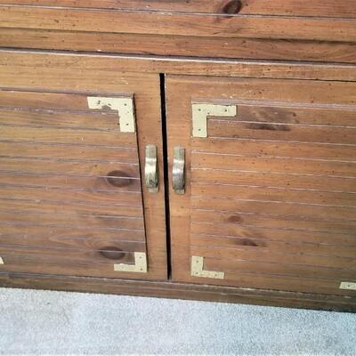 Lot #102  Vintage Bassett Cabinet with Brass Trim