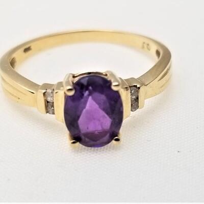 Lot #108  14kt Gold Amethyst ring with Diamond Chips - size 7