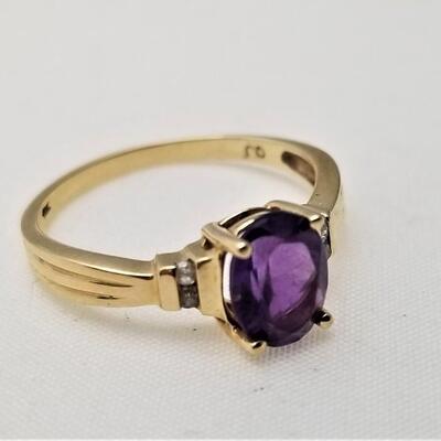Lot #108  14kt Gold Amethyst ring with Diamond Chips - size 7