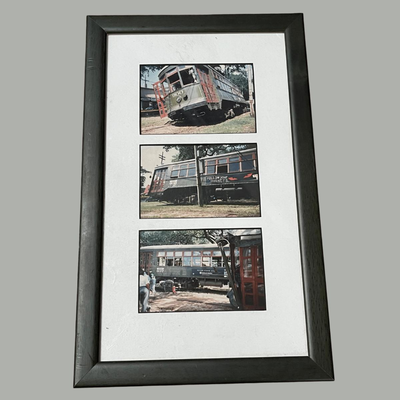 Framed Photos of the Destruction from Katrina of the Streetcars