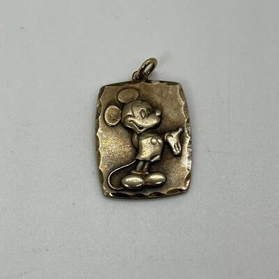 LOT 20: Two Sterling Mickey Mouse Disney Pendants
