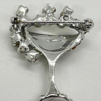 LOT 29 Trio of Brooches - Tortalani Bow, Pell Cocktail Glass, Kramer of NY Chunky Starburst