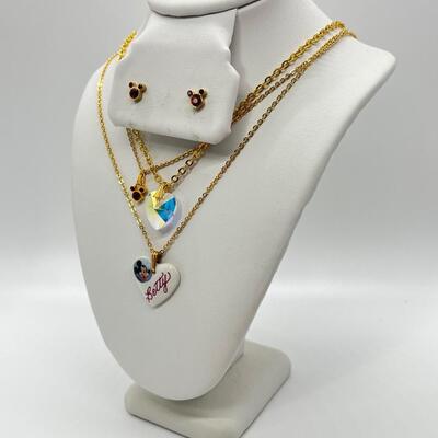 LOT 33: Three Necklaces w/ Pendants and a Pair of Earrings