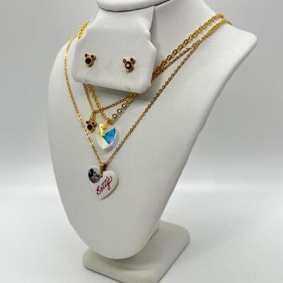LOT 33: Three Necklaces w/ Pendants and a Pair of Earrings