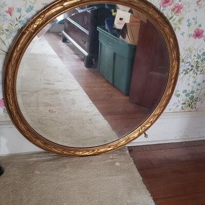Antique round mirror with beveled Edge
