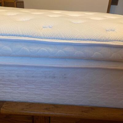 P2 Pillow top Queen mattress, stains that are visible are pictured.