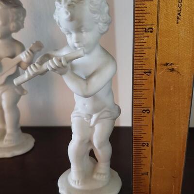 4 porcelain musicians, 5" tall