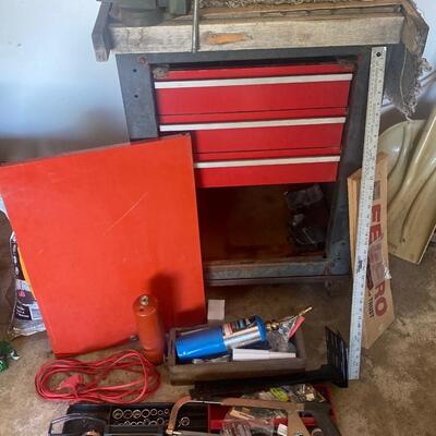 G10 tool box with vise on the top, wooden top is fastened on there. Door doesnâ€™t have a handle. Misc tools and other items