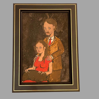 Couple with Nutria on Lap