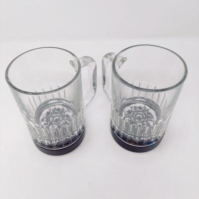 PAIR OF LIGHTED GLASS BEER MUGS