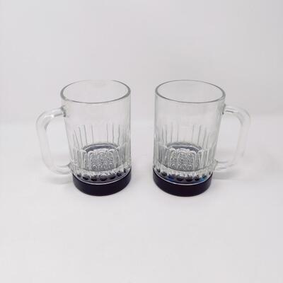 PAIR OF LIGHTED GLASS BEER MUGS