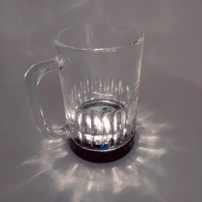 PAIR OF LIGHTED GLASS BEER MUGS