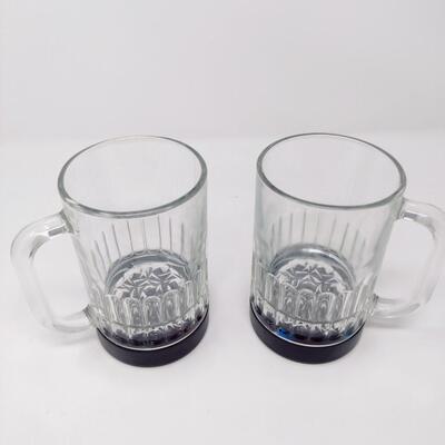 PAIR OF LIGHTED GLASS BEER MUGS