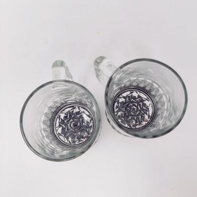 PAIR OF LIGHTED GLASS BEER MUGS