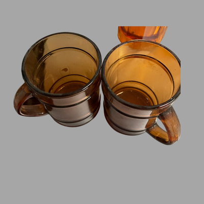 Two Vintage Amber Glass Coffee Mugs