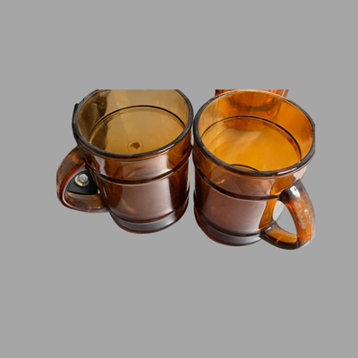 Two Vintage Amber Glass Coffee Mugs