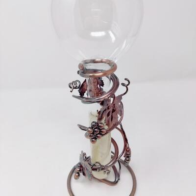 FLOATING GLASS TAPER CANDLE HOLDER