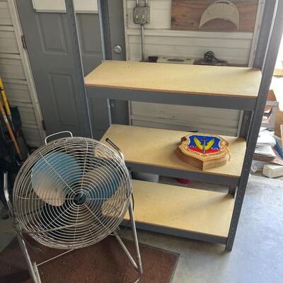 FS100 shelving unit, fan, and plaque