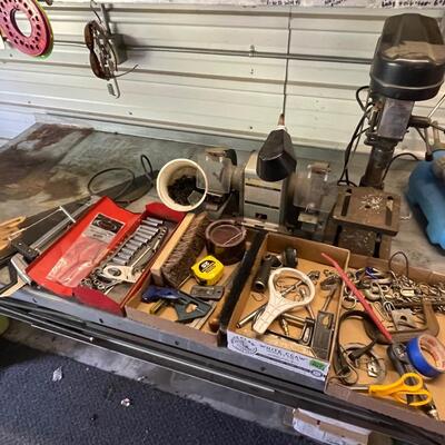 FS71 Five speed drill press, bench grinder, hardware, tools, miscellaneous shop supplies and a rough neck tote with lid