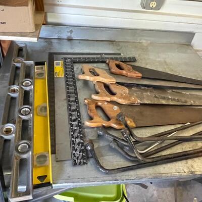 FS68 Levels, squares come up saws, miscellaneous tools and a roughneck tote with lid