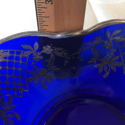 Silver overlay on cobalt blue bowl