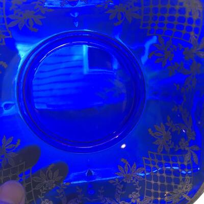 Silver overlay on cobalt blue bowl